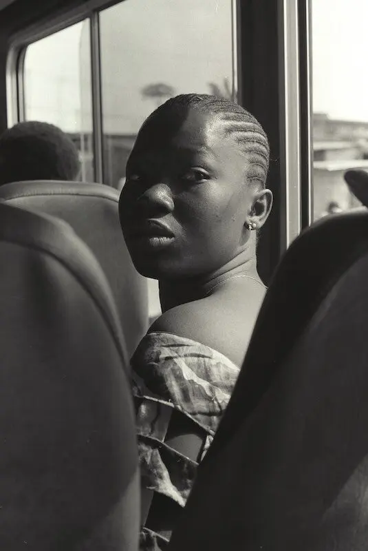 Woman on a bus, Africa